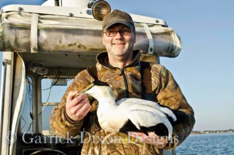 A proud hunter with his eider