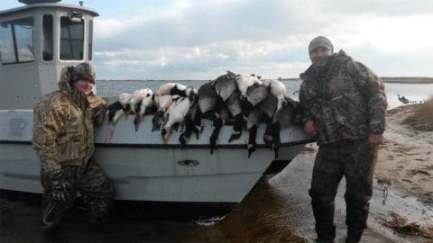 Hunter, the hunting boat, and the sea ducks hunted that day