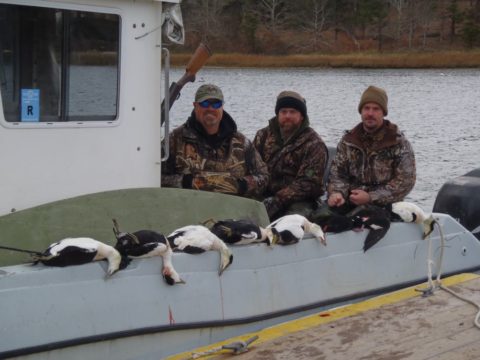 Hunters display the results of their sea duck hunt